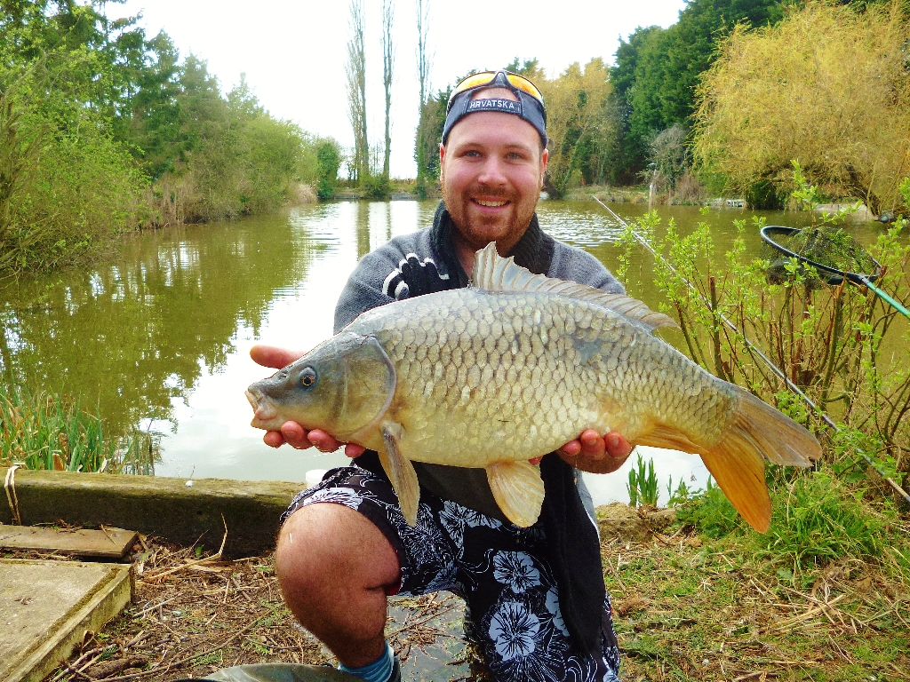 Our son, Daniel at our family run fishery