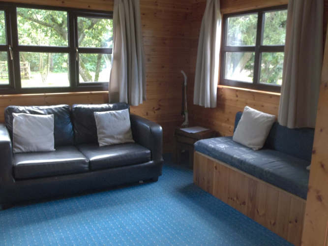 The living room in one of our fishing holiday lodges