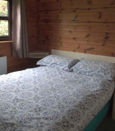 The double bedroom in the fishing lodge